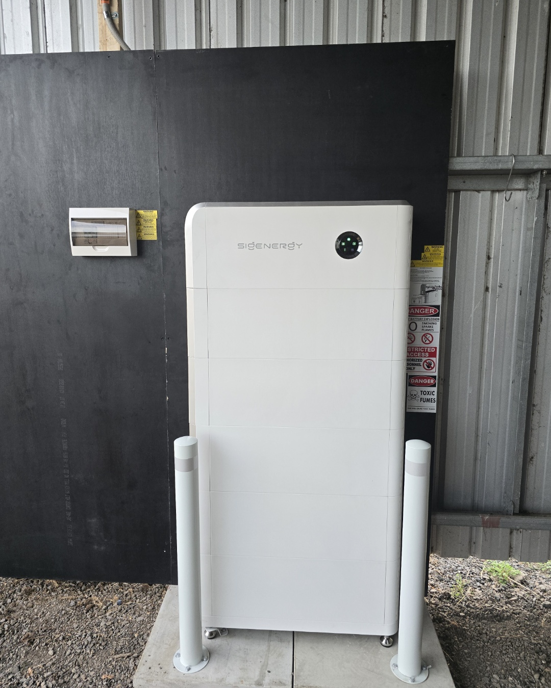 Vortex Sigenergy battery stack installed with protective bollards